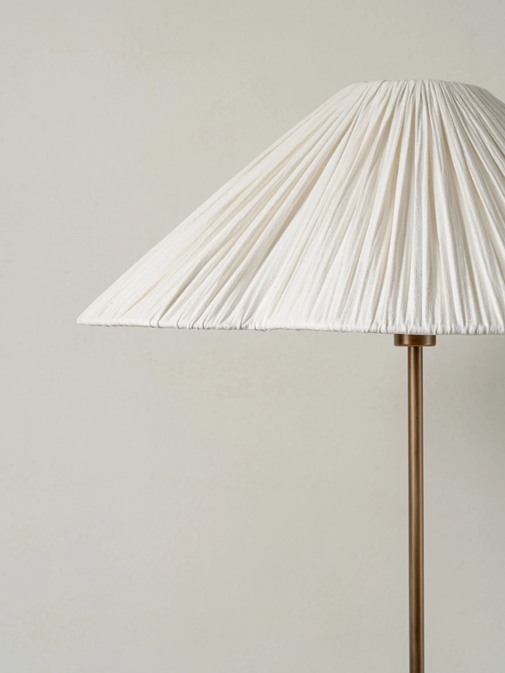 Lindi - aged brass and linen scalloped floor lamp